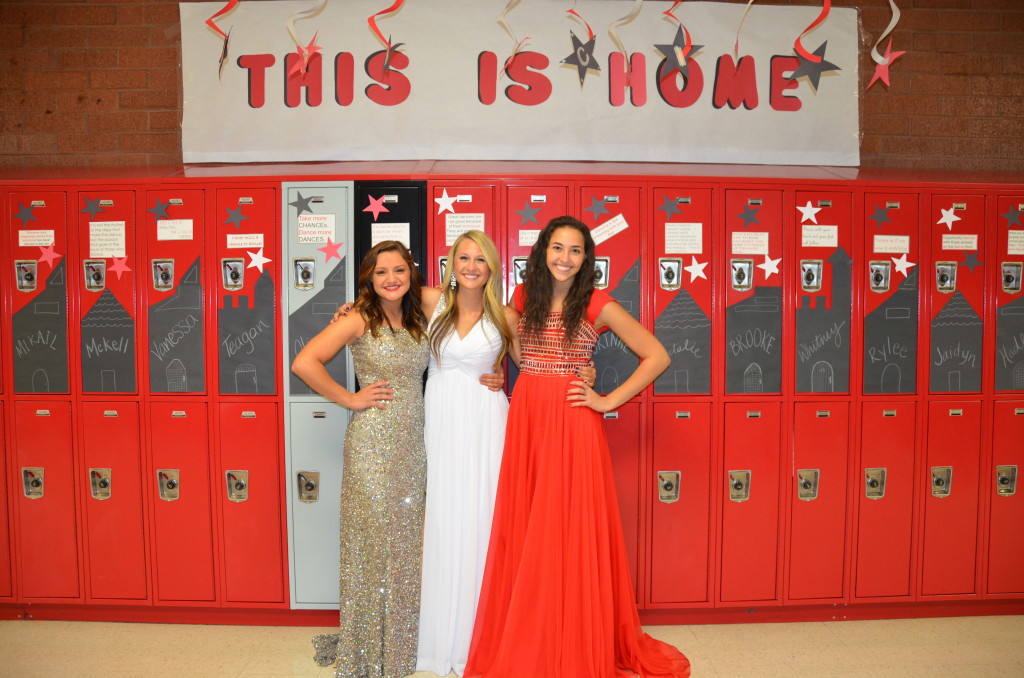 The Three Homecoming Queen Finalists.  Ashley is on the left in the red dress.