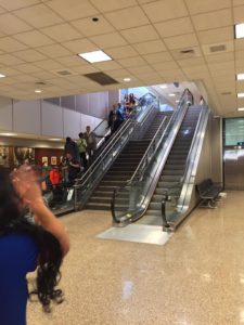 Our first glimpse of her coming down the escalator